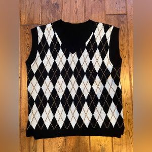 Black, white, and gold argyle sweater vest.